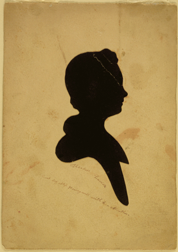 Silhouette of a woman cut from paper